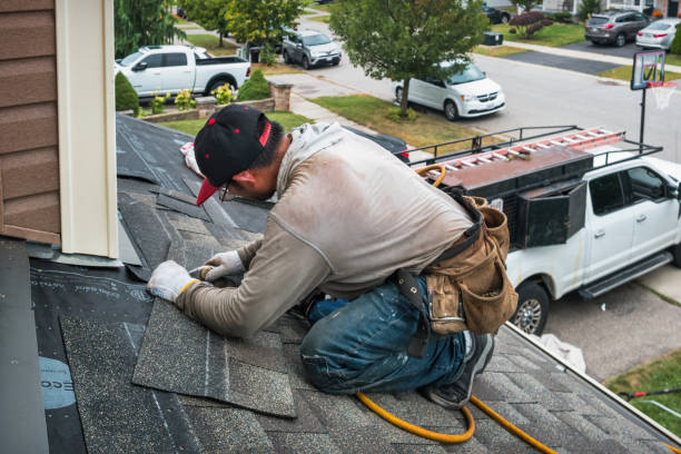 Professional Flat Roof Repair technician working in Freeport, TX
